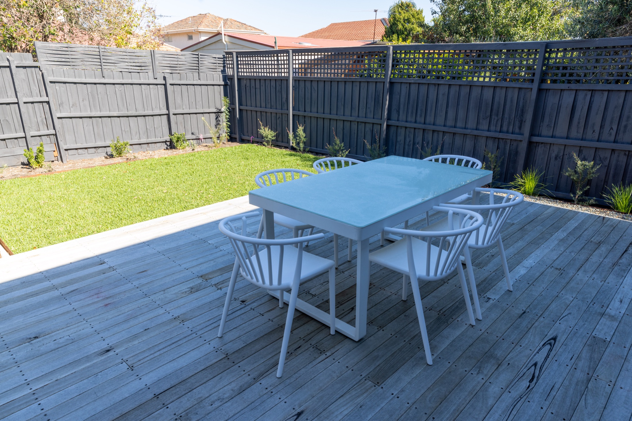 Rear timber deck and private garden with integrated bench seating